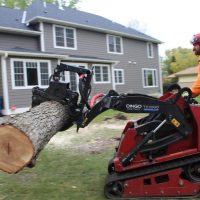 Toro with a Branch Manager grapple attached