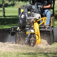 Branch Manager stump grinder being used to grind a stump