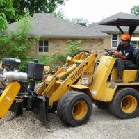 Branch Manager stump grinder being used to grind a stump