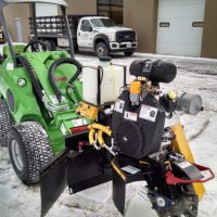 Branch Manager stump grinder being used to grind a stump